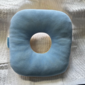 This is my piercing pillow I use it every night to avoid putting pressure on my ears and my ear piercings, I used to wake up with sore ears every day but not anymore!