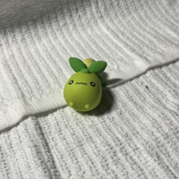 This complex object is an eraser of the Pokemon Smoliv. I bought this with my little sister and really enjoy collecting Pokemon trinkets with her so it makes me happy to see my Pokemon collection.